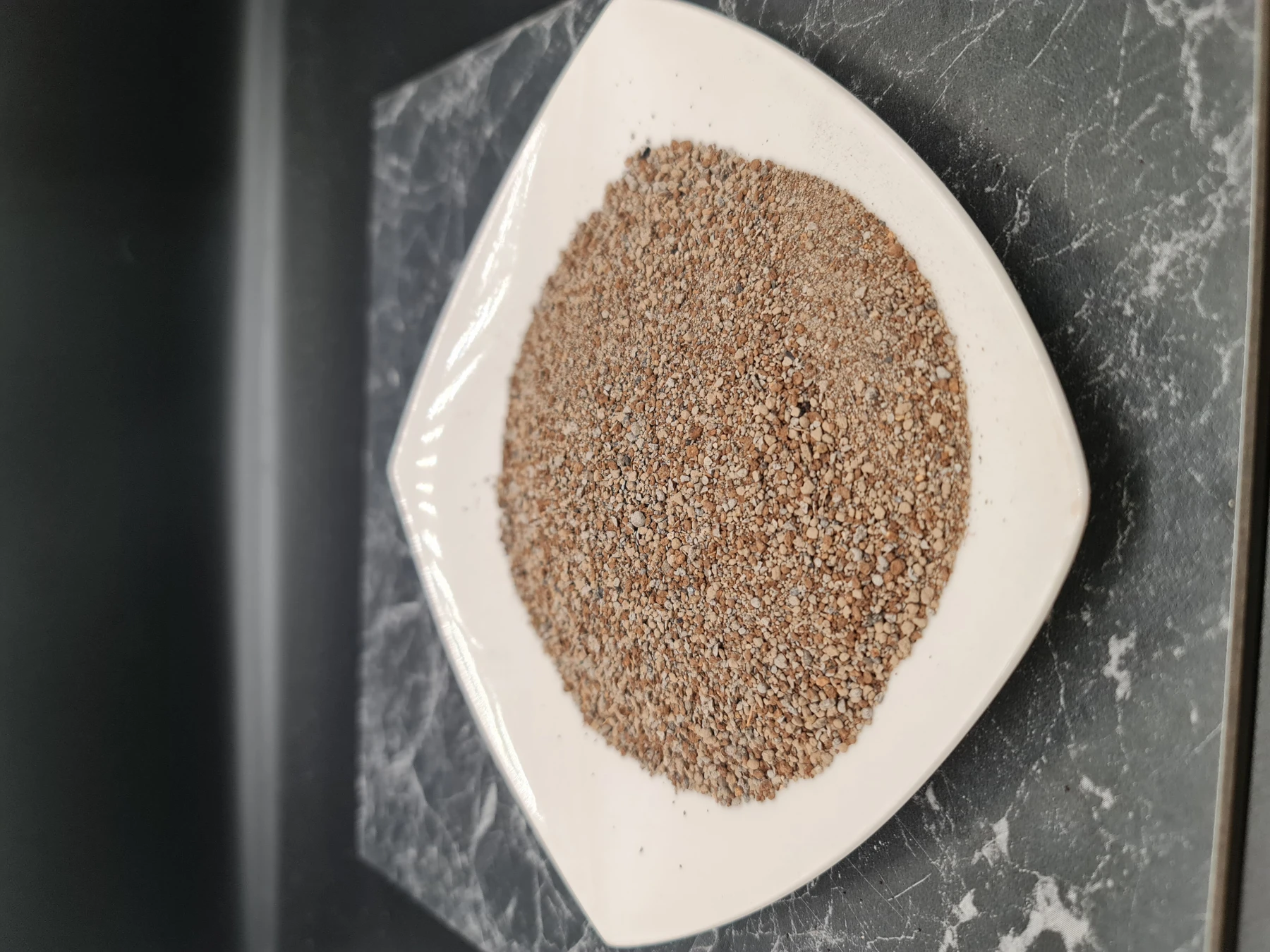 Palmasche granuliert